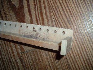 This is the old lower jack rail. I was supposed to strip off the piece with the holes in it, and use the other parts. Oops. 