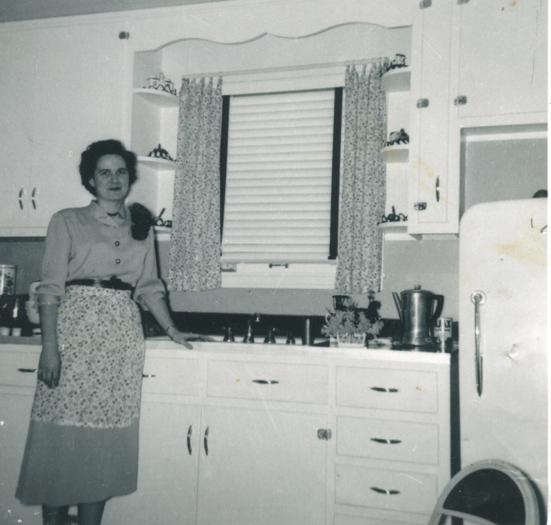 I love this picture of my Mom. Is she a new bride in a new kitchen? Sure looks like it.